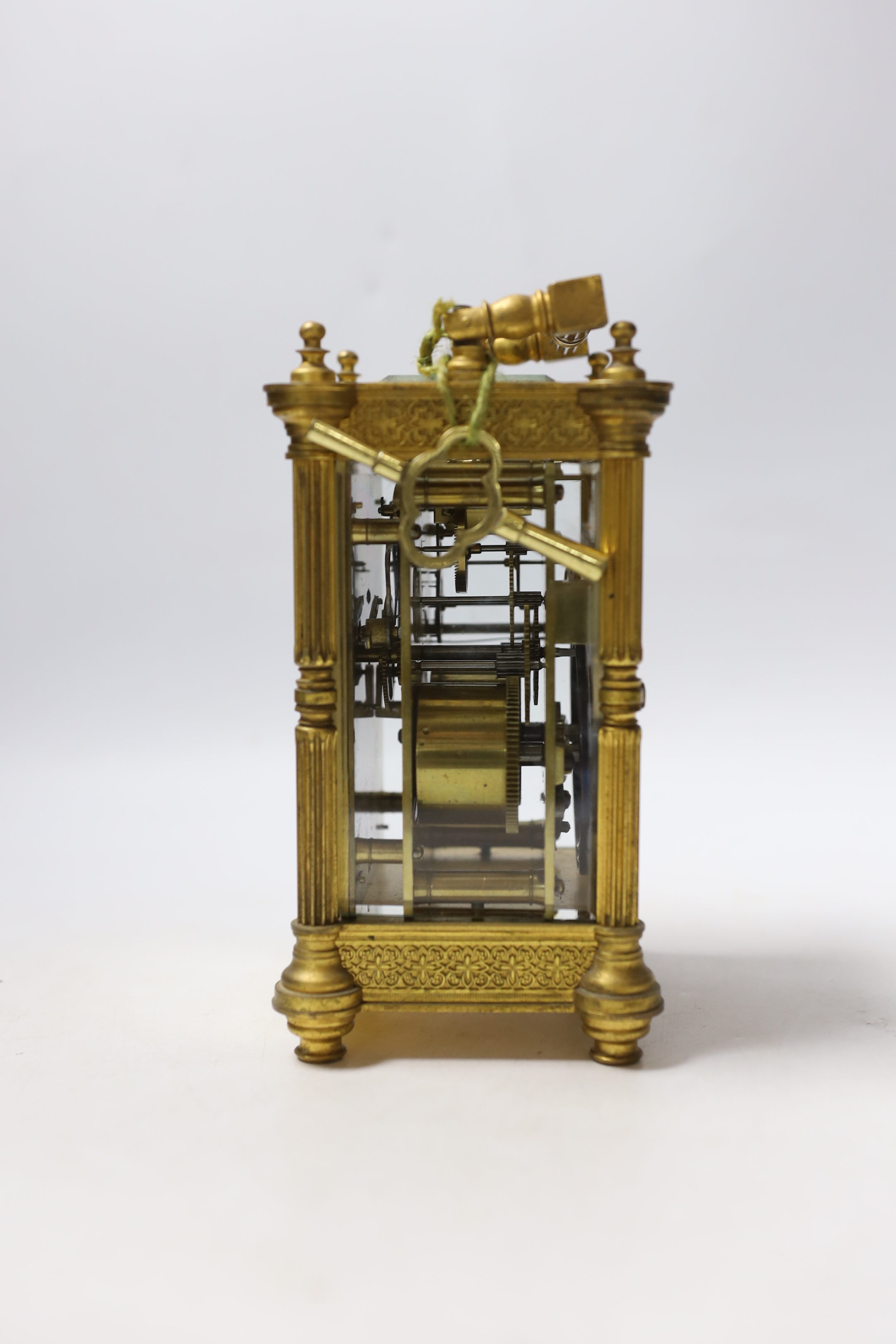 An Edwardian carriage timepiece with blind fretwork decoration, 16.5cm